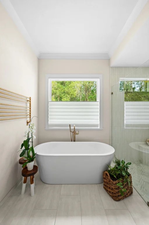 Oakmont — Hunter Douglas Vignette Roman shades in a spa bath